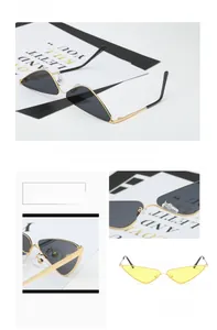 Détail de lunettes de soleil triangulaires vintage en métal avec monture dorée et verres