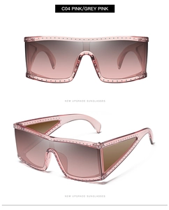 Detailed view of pink punk oversized square sunglasses with metal rivet accents