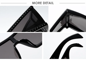 Detail view showing black square frame sunglasses with silver rivet studs and metal hinges