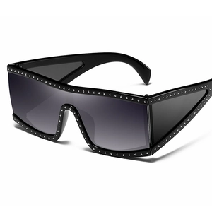 Oversized punk shield sunglasses with silver rivets and sleek black wrap frame