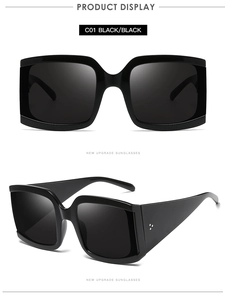 Vue rapprochée des branches larges noir brillant avec triple point argenté sur les lunettes