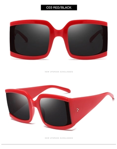 Vue détaillée des lunettes de soleil rouges carrées avec rivets argentés et verres