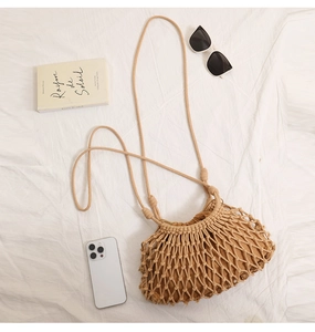 Detail of hand-woven cotton rope texture with inner lining on khaki beach bag