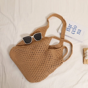 Hollow cotton crochet tote bag in brown for beach vacation and casual daily use