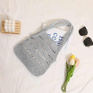 Silver crochet straw shoulder bag with hollow stripes for beach holidays and vacations