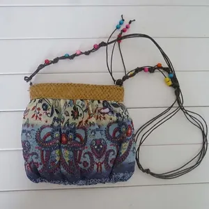 Bohemian paisley printed cotton shoulder bag with straw trim and colorful beads
