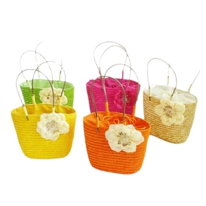 Handmade floral straw handbag set in five bright colors for summer beach vacations