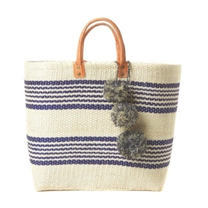 Handmade bohemian striped straw tote bag with navy stripes and dark grey pompom charms