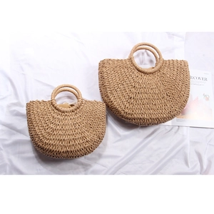 Two-piece set of semi-circular straw handbags with round handles for summer beach vacations