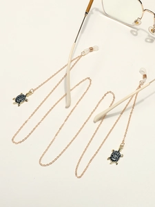Chaîne à lunettes dorée élégante avec pendentifs tortue et boucles en silicone antidérapantes