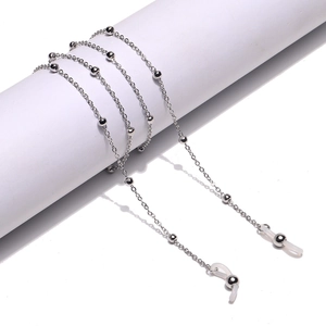 Detailed view of silver pearl chain with silicone loops for glasses or face masks