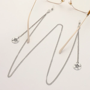 Silver punk glasses chain featuring vintage star and moon pendants on a white background