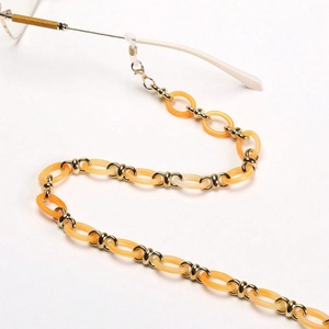 Chaîne de lunettes tendance avec maillons en acrylique orange clair et anneaux dorés