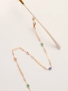 Golden sunglasses chain with colorful flower beads and non-slip loops for women