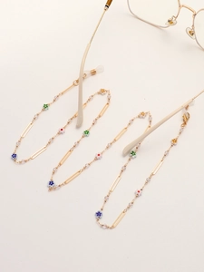 Golden eyewear chain featuring multi-color floral charms and silicone grips for sunglasses
