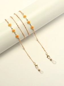 Gold metal glasses chain with yellow daisy pendants and anti-slip silicone loops