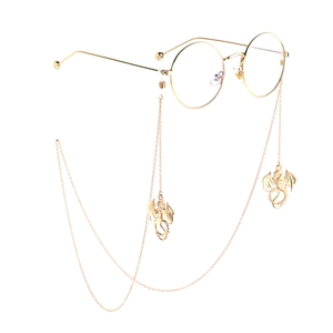 Chaîne de lunettes argentée avec pendentifs dragon sur monture ronde dorée