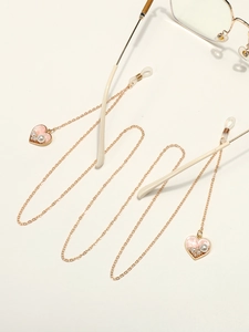 Elegant gold metal glasses chain featuring pink pearl heart pendants and white pearls