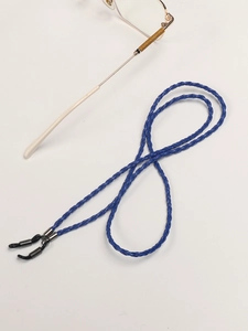 Detail of dark blue braided PU leather glasses strap with silver clips and rubber loops