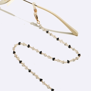 Gold chain glasses holder with black and clear triangle beads and adjustable silicone loops