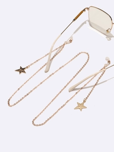 Golden metal eyewear chain with star-shaped pendants and non-slip rubber loops