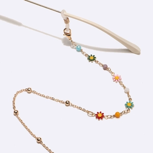 Chaîne à lunettes dorée avec breloques fleurs colorées et boucles antidérapantes