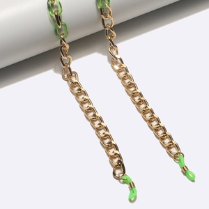 Fashionable green resin acrylic and gold metal eyeglass chain with silicone loops