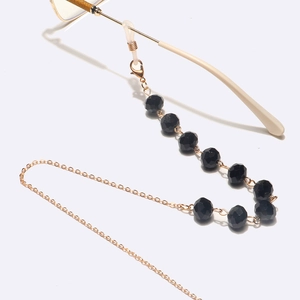 Fashionable gold metal eyeglass chain with black crystal beads and silicone loops