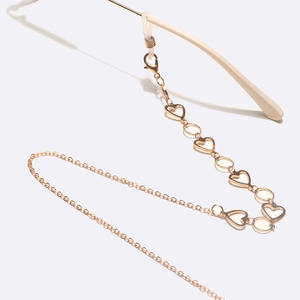 Elegant gold heart link eyeglass chain with heart-shaped metal charms and silicone ends