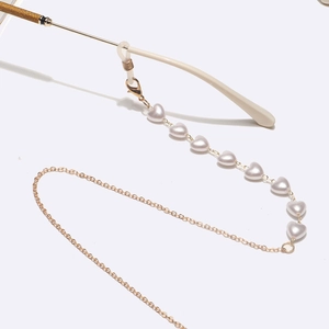Gold glasses chain featuring heart pearls and lobster clasp for sunglasses or face masks