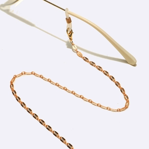 Golden lip chain eyewear strap with lobster clasps and non-slip rubber loops