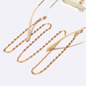 Fashionable gold metal eyeglass chain with flat oval links and adjustable silicone loops