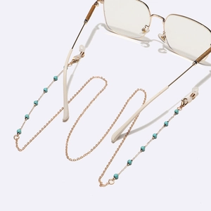 Chaîne de lunettes dorée avec perles de turquoise et boucles en silicone souple