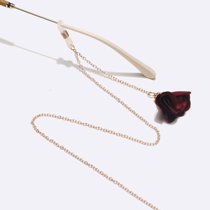 Golden metal eyewear chain with dark red silk rose charm and anti-slip silicone loops
