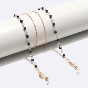 Chaîne de lunettes dorée avec perles en cristal noir et transparent pour femmes