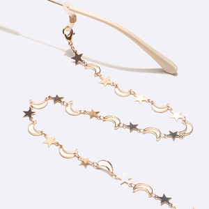 Catenella per occhiali dorata con ciondoli a stella e luna e asole antiscivolo