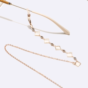 Gold metal glasses chain with square rhinestones and geometric mirror charms