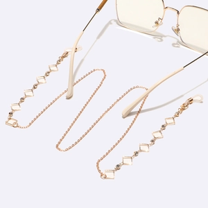 Minimalist gold metal eyewear chain with square crystals and round rhinestones