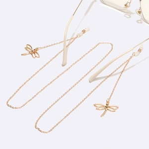 Slim gold metal eyeglass chain with hollow dragonfly pendants and silicone grips