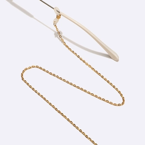 Minimalistische goldene Brillenette mit ovalen Gliedern und Silikonschlaufen