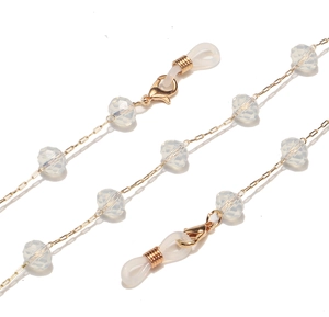 Fashionable eyeglass chain with gold metal links and translucent white natural stone beads