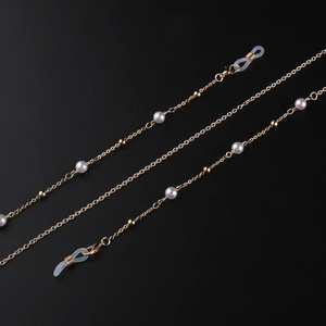 Chaîne de lunettes élégante en métal doré avec perles blanches et boucles silicone