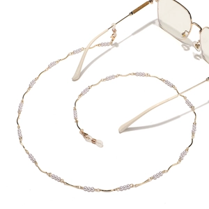 Elegant gold wavy bar and white pearl eyeglass chain with secure silicone loops