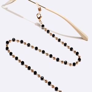 Chaîne de lunettes en cristal noir avec perles dorées et fermoirs mousquetons