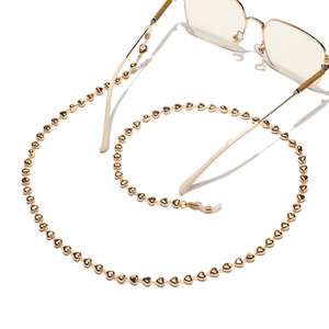Handmade golden eyewear chain with heart-shaped beads and non-slip rubber loops