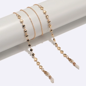 Gold metal eyewear chain with star charms and adjustable anti-slip rubber loops