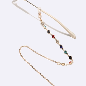 Modische Brillen-Kette aus Goldmetall mit bunten Strasssteinen und Silikonschlaufen