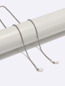 Silver twist chain eyewear holder with adjustable silicone loops on white pedestal