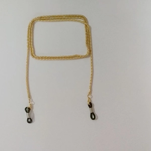 Polished gold 2.4mm thick hollow metal eyewear chain with non-slip rubber loop connectors