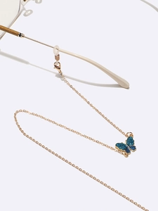 Chaîne de lunettes dorée avec pendentif papillon bleu pailleté et boucles antidérapantes